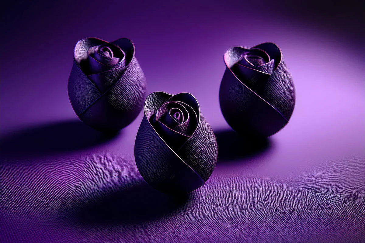 Three purple rose-shaped massage vibrators on a matching textured surface
