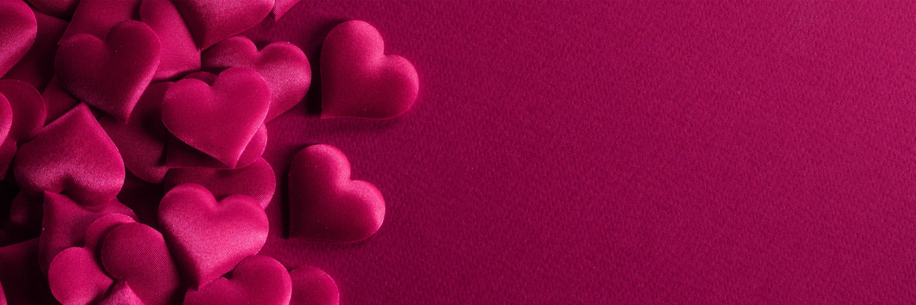 Pink hearts on a pink background